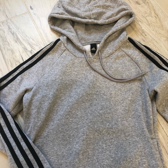 grey adidas jacket with black stripes